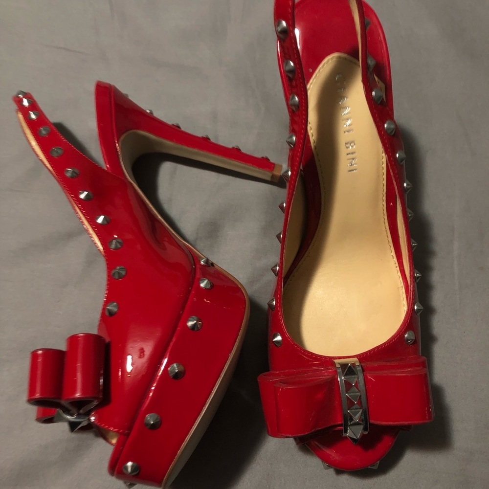 Red Spiked Heels
